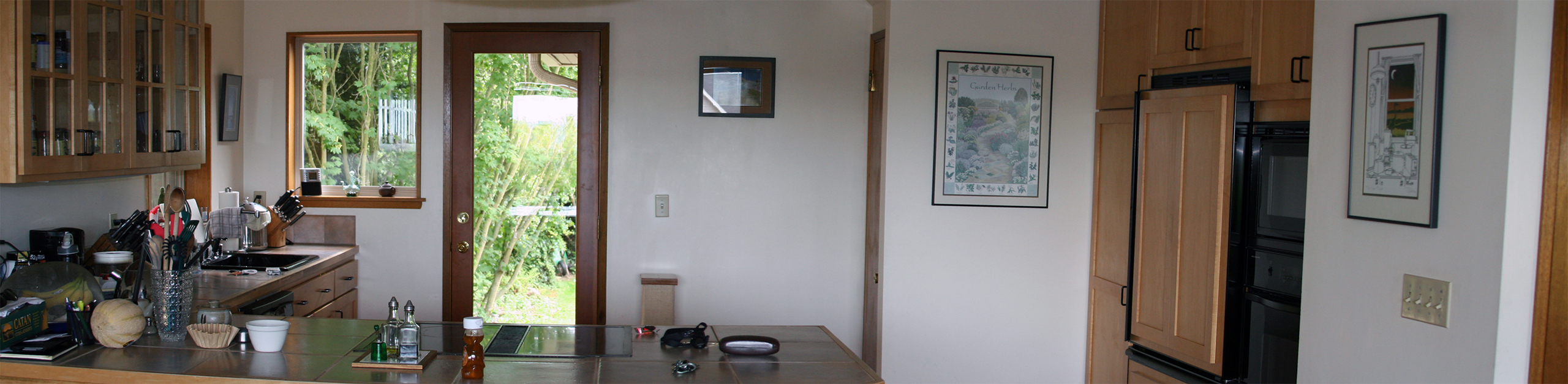 92nd Street Remodel & Addition - Before and After Remodel Photos: View into the Kitchen from the Dining Room, Before